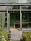 Conservatory from courtyard with pool 