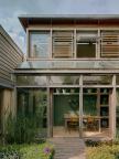 Conservatory from courtyard with pool 